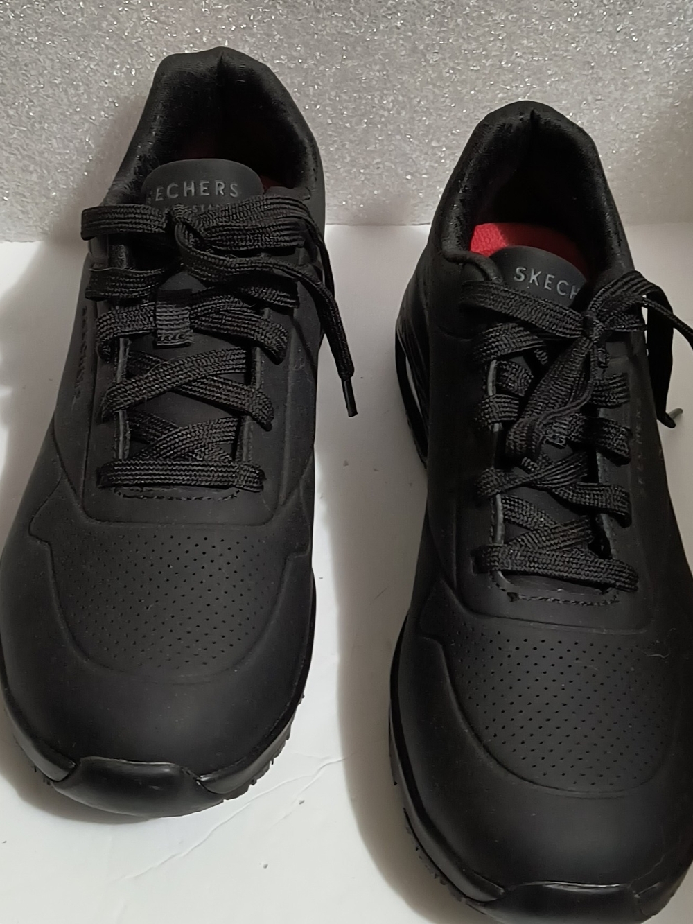 Skechers Men’s Black Athletic Lace-Up Sneakers with Red Insole Accent